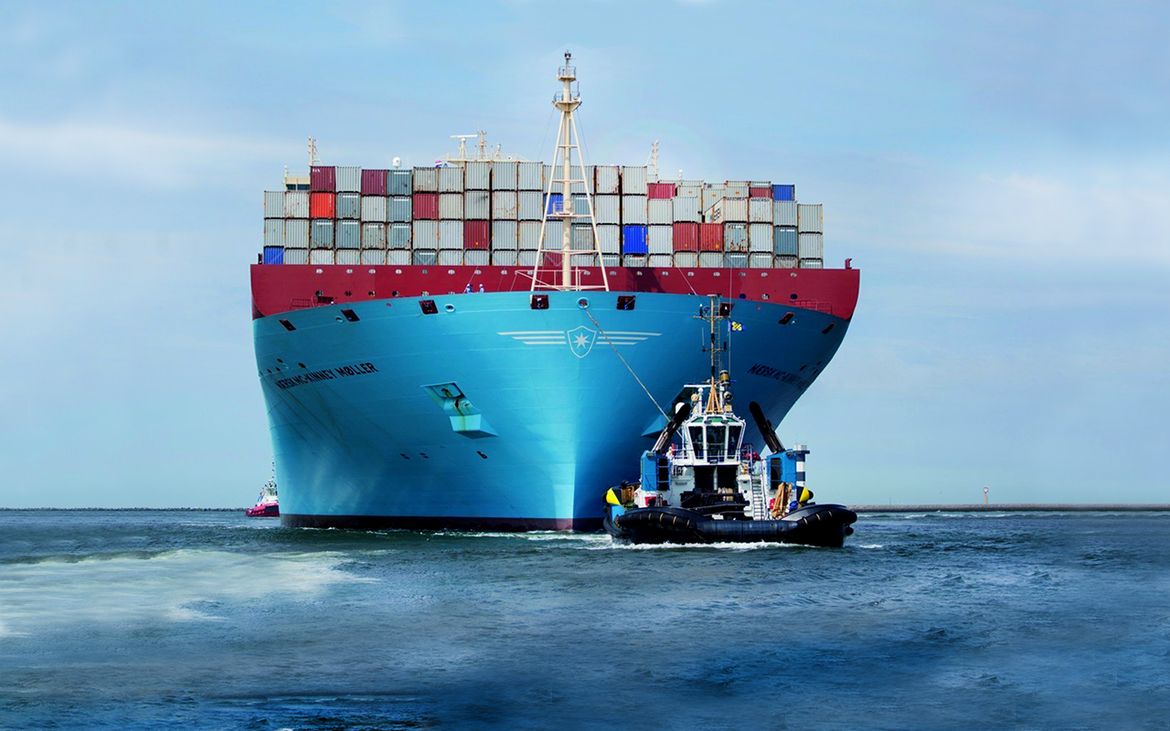 A container ship under tow arriving in Panama