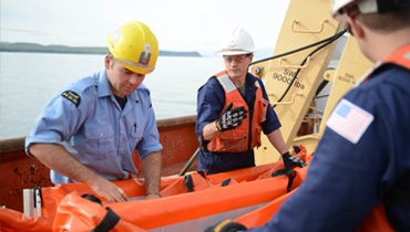 Crew in safety gear during a crew change operation
