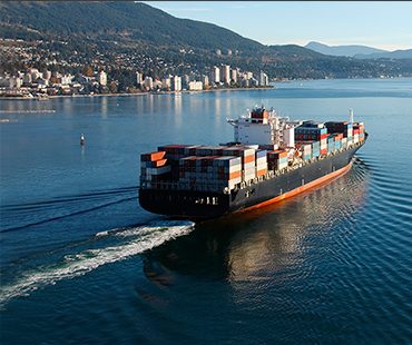 A container ship under way off the Panamanian coast