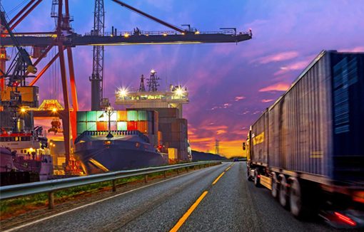 Container terminal and road haulage at dusk, ship chandlery logistics in Panama