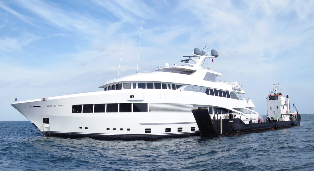 A superyacht alongside the Nolkata Marine support vessel off Panama